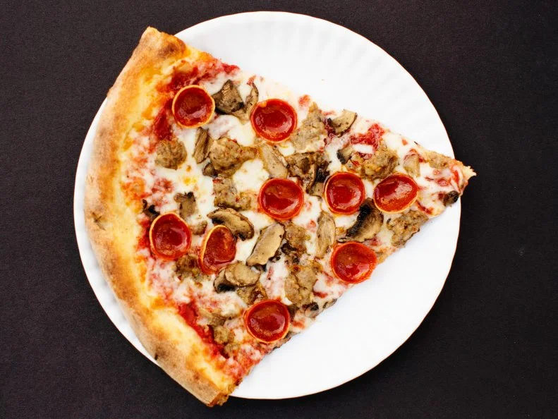 The inspiration for this Minneapolis slice shop started flickering to life during meals on a shabby couch in New York City. It was there that then-student Ann Kim scarfed down many a slice, which in turn sparked the passion for New York-style pizza that inspired her second restaurant endeavor. In 2013, Chef Kim debuted her ode to the pizza of the Big Apple with the opening of Hello Pizza in the Mini Apple. The shop stands out for its careful attention to the craft, ingredients and, most importantly, grease that have come to define the quintessential New York slice. The menu features a mix of salads, meatball subs and pizza, of course. Sicilian-style and thin-crust pies can be customized with a slew of toppings, which include Berkshire bacon, Kalamata olives and organic spinach. Prefer to leave the combinations to the pros? Opt for a specialty pie like the top-selling Hello Trinity, which blends sweet red sauce with whole milk mozzarella, house-made fennel sausage, natural casing pepperoni and cremini mushrooms on a dense, chewy crust.