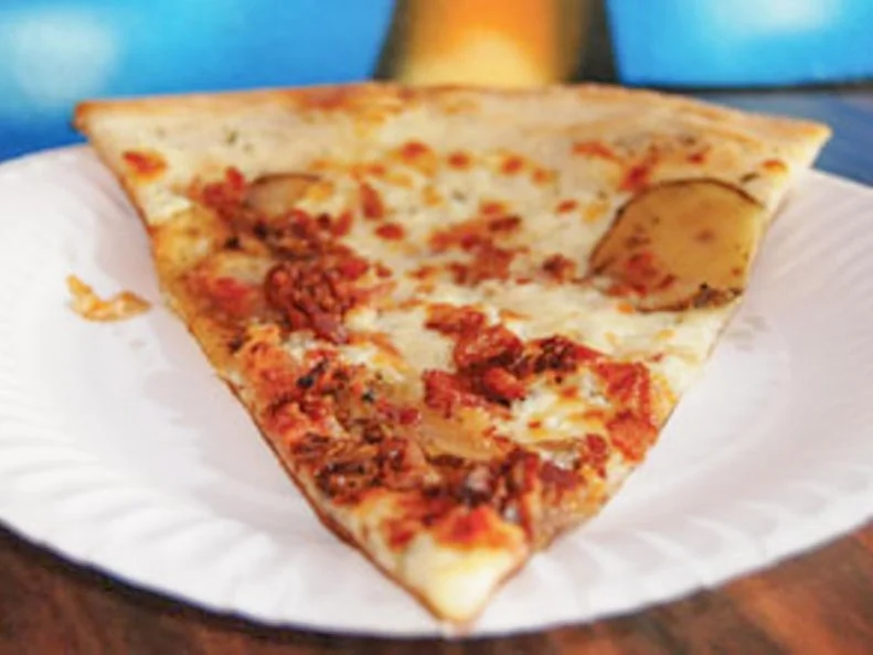 Owner Russ Crawforth's inspiration for Piehole came during a trip to San Francisco in 2005. When he stumbled across the 3 a.m. crowds at Pizza Orgasmica, he saw a line stretched all the way down the block. Instantly, Crawforth knew he had to create the kind of pizza that would inspire that same late-night enthusiasm in his hometown of Boise, Idaho. Open all day and into the early hours of the morning, Piehole offers a solid selection of pizza. Classic slices like cheese and pepperoni share the menu with creative combos like basil-roasted bell pepper and potato-bacon (pictured above). Crawforth also keeps it fresh with a rotating slice of the day.