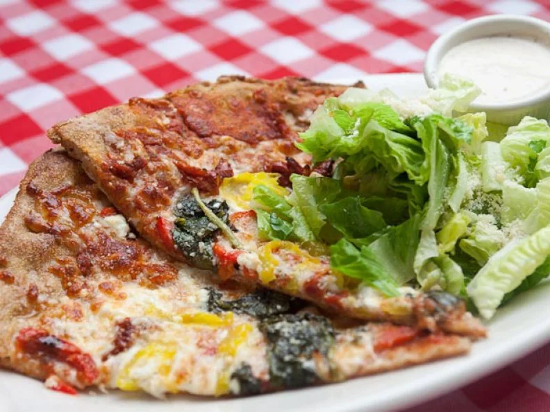When Chef Daniel Blumenthal and Jeff Good opened Sal & Mookie’s in 2007, they brought the City of Jackson something it was sorely missing: authentic New York City pizza. These pies aren’t just good for Mississippi — they’re just damn good, period. The team put a painstaking amount of research into their pizza recipe, coming up with a key list of ingredients (King Arthur flour, whole milk mozzarella and imported Italian tomatoes) and just the right ratio of dough to sauce to cheese. Every pie is cooked in a brick-lined, gas-fired oven to ensure a crust that’s both chewy and crisp. Pro tip: Stop in for the lunchtime slice special and don’t leave without a scoop from the full-sized ice cream parlor in the middle of the restaurant.