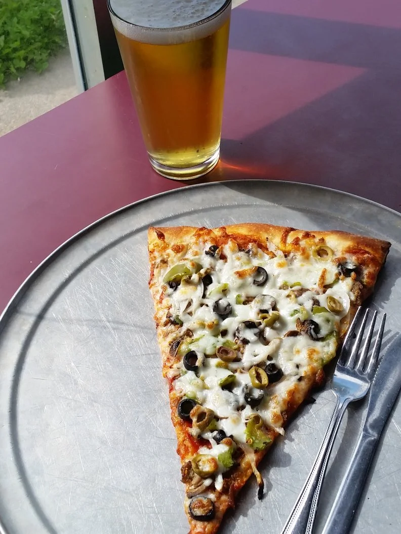 Known as Little Rock’s first brewpub, Vino’s has been drawing the crowds with its combination of live music shows, house-brewed beers and New York-style pizza since 1993. The mushroom and Italian sausage pizza alone has earned a legion of local fans. This fan favorite features a sturdy yet chewy, foldable crust evenly spread with chopped mushrooms and bits of savory meat. Even specialty pizzas like the Muffaletta are available by the slice, so you can find out what the fuss is about without having to commit to an entire pie. And with no silverware necessary, Vino’s slices are perfect for devouring while getting your dance on.