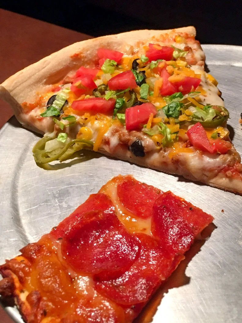 What’s better than a slice? All the slices! That’s what you’ll find at this Kansas City spot, which offers an all-you-can-eat lunch buffet stocked with salads, pastas and multiple types of pizza from 11am to 2 pm daily. It’s one of the few places in Missouri where guests can sample St. Louis-style ‘za by the slice. The city’s signature pies are characterized by their paper-thin crusts and Provel cheese, a processed blend of Swiss, cheddar and provolone. At Waldo Pizza, they add whole milk mozzarella and muenster to the mix.