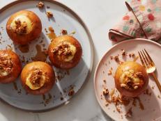 Stuffed with cheesecake and topped with caramel sauce, buttered graham cracker crumbs and walnuts--these upgraded baked apples are the ultimate autumn dessert.