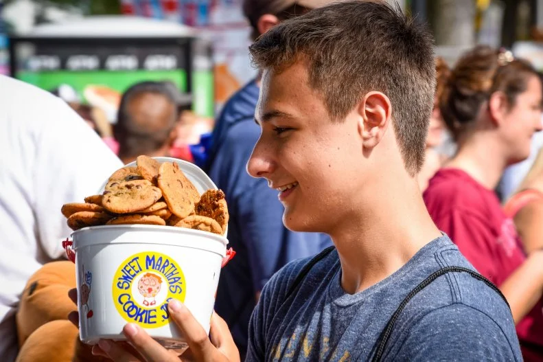 Nearly two million people visit the Minnesota State Fair annually, so it’s no wonder a staggering amount of food is served by the 300-plus vendors on the premises. Case in point: Sweet Martha’s Cookie Jar. Owner Martha Rossini Olson and her team bake 2,000 cookies per minute (yes, minute) to keep up with demand. Her signature warm chocolate chip cookies can be ordered by the cone or bucket. Want to supplement your sweet snack with more sustenance? The fair offers more than 500 different dishes, ranging from the typical deep-fried and on-a-stick bites to gluten-free, vegetarian and global foods. 