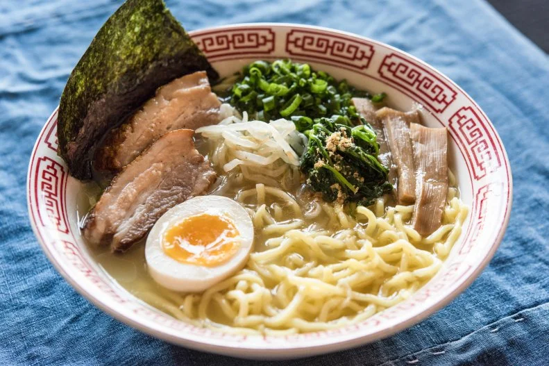 The playful menu at this ramen bar under the Hawthorne Bridge includes a grated-vegetable â  â  80s salad,â   a double cheeseburger and some of the best ramen in a town so rife with ramen, multiple Japanese chains have chosen to locate their first U.S. outposts here. Choose from chicken, pork or both, with silky broth and springy noodles ($9); add an egg for an extra buck.