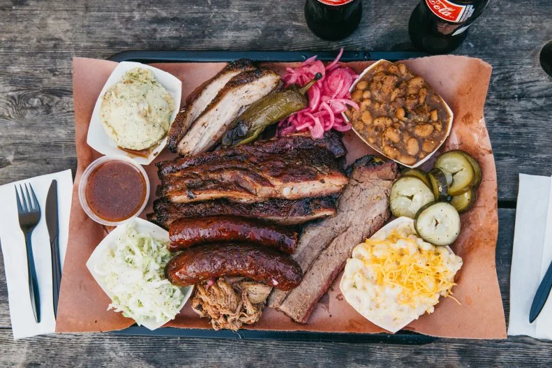 If you seek Texas-style barbecue by way of Australia on the patio of a German beer bar, Matt’s is the food cart for you. Until they sell out of it, there’s brisket, pulled pork, housemade sausage and ribs ($6.50 for half a pound), all of which come with sauce, pickles, and bread. Get the whole shebang for two — that’s brisket, pork, a sausage and two ribs, plus coleslaw, potato salad, and pinto beans — for just $25.