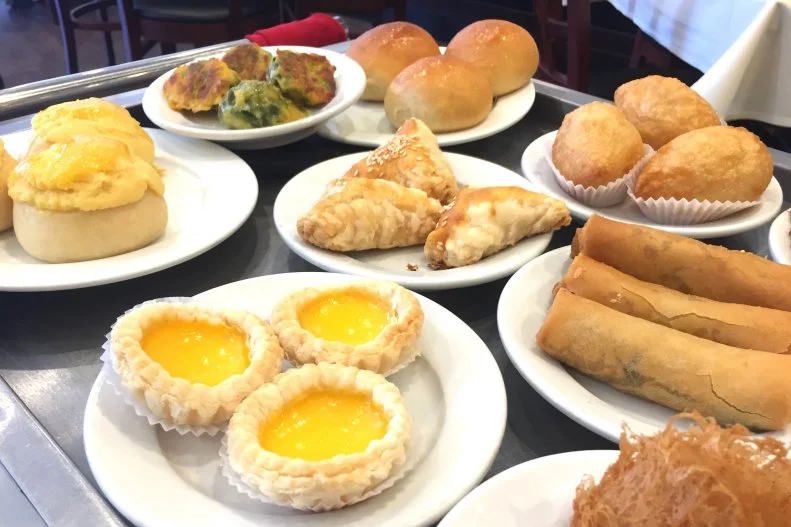 D.C. dwellers had long lamented that a dim sum craving used to necessitate a trip out to Falls Church or up to Wheaton — that is, until this spot opened on 14th Street NW offering aromatic carts of dumplings, roast duck ($8.45), beef chow fun ($8.45) and pork buns ($4.25). Aside from the reliable plates of shrimp-stuffed eggplant ($4.75), sticky rice with sausage and heaping servings of Chinese broccoli ($7.45), one of the best parts is that the silver carts roll through the dining room from 10 a.m. to 3 p.m. daily, rather than just on weekends. Prices range between $4.25 and $9.45 and, of course, the best way to keep this cost-effective is to go with friends who like to share.