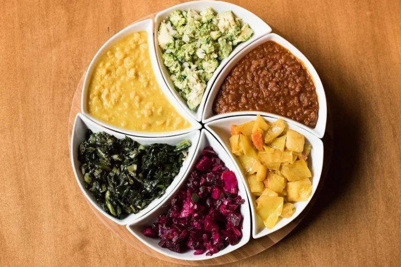 Sure, you could save a few pennies by ordering one vegetable dish for $11.50 rather than opting for the veggie sampler for $17.50, but you get so much with the sampler that you might as well bring a friend and split the cost. An order comes with a choice of any four vegetarian dishes, plus two side salads. Try the mushroom dulet cooked with red onion, garlic and jalapeño; smoked cabbage with carrots, potatoes with caramelized onion; and kik, a rich stew of yellow split peas simmered with onion, garlic and ginger. The Letena salad — which blends lightly steamed broccoli with avocado — will make you rethink these two ubiquitous green veggies altogether.