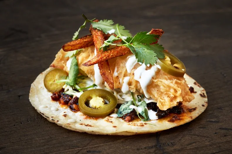 Not all tacos need to evoke a legit Mexican street stall. Take the Sid Vicious, named for the notorious Sex Pistols front man, which tastes more like what would happen if a plate of fish and chips went on vacation in Baja. Youâ  ll find the tortilla filled with crispy cod, malt vinegar salsa macha, mint tomatillo slaw and tartar sauce under the â  taco nuestrosâ   section of the new Chinatown Taco Bamba for $4.50 apiece. If youâ  re at the Falls Church location, try the Black Pearl taco, a longtime favorite stuffed with fried grouper, spicy slaw and black aioli.