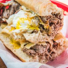 This subterranean sandwich shop — run by a chef and his parents — easily won the heart of locals with its mom-and-pop feel and gargantuan sandwiches. Among the roster of satisfying options is the signature beef brisket, a torpedo-sized umami bomb that would satisfy the hunger of a sumo wrestler stranded on a desert island. The slow-braised brisket slathered with apple-horseradish cream, aged gouda and veal jus sells for $10 a half or $18 for a whole sub, and you shouldn’t need much convincing to spring for the fried egg on top for $1 more.