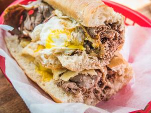 This subterranean sandwich shop — run by a chef and his parents — easily won the heart of locals with its mom-and-pop feel and gargantuan sandwiches. Among the roster of satisfying options is the signature beef brisket, a torpedo-sized umami bomb that would satisfy the hunger of a sumo wrestler stranded on a desert island. The slow-braised brisket slathered with apple-horseradish cream, aged gouda and veal jus sells for $10 a half or $18 for a whole sub, and you shouldn’t need much convincing to spring for the fried egg on top for $1 more.