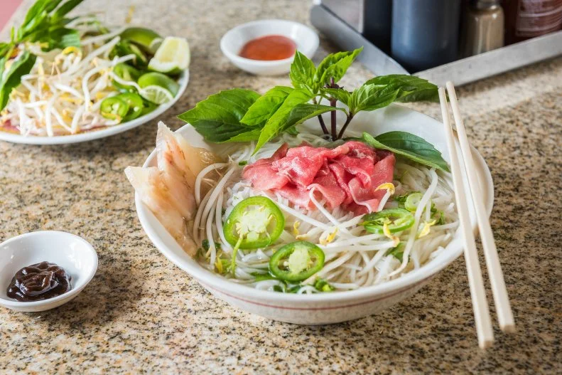 You could drive yourself crazy trying to find the area’s perfect bowl of pho, but the lines at this longtime Arlington favorite are an easy way to tell that the cash-only old-timer still holds sway. It’s tempting to stick with what you know and opt for something like brisket or paper-thin slices of rare steak for your steaming bowl of broth and noodles, but the addition of tripe and tendon undoubtedly adds richness to the broth — even if you have no intention of eating tripe or tendon. The hefty regular-sized bowl costs $7.95, but you might as well go for the large for a dollar more and take some home. And don’t worry, those lines go super fast. With only one thing on the menu, these expert pho slingers know what they’re doing.
