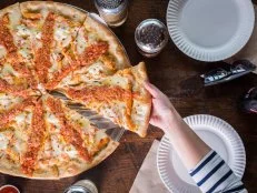 Washington may be a quick train ride from New York, but it doesn’t mean the New York pizza abounds. For the next best thing, dive into Wise Guy. Sure, you could go traditional with the supreme or margherita, but why not indulge with some carb-on-carb love and order a slice loaded up with creamy, tomato-y pasta? Slices from the 20-inch pies cost a very reasonable $2.99-$3.99, making this filling lunch very pennywise.