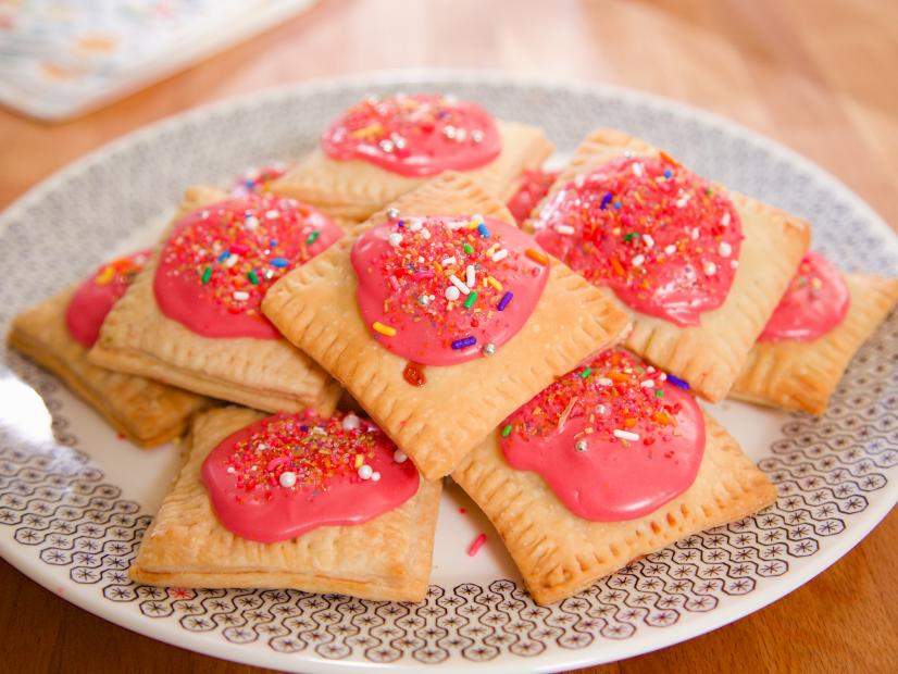 Pastry pockets with raspberry glaze and sprinkles