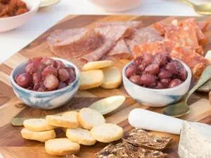 Food beauty of Charcuterie and cheese plate, as seen on Giada on the Beach, Season 1.