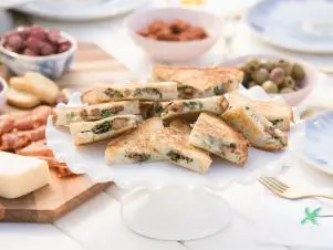 Food beauty of Spicy Sausage and Broccoli Panini, as seen on Giada on the Beach, Season 1.