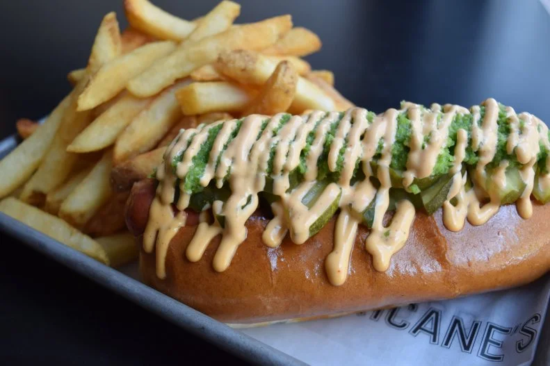 Just steps from the TD Garden is this sports bar serving up twists on pregame classics like burgers and pizzas. Prepare for heat in the hot dog section, because the Pickleback packs a punch, topping a quarter-pound hot dog with bright green jalapeno puree, a hefty drizzle of spicy mayo and plenty of crisp pickles for added bite.
