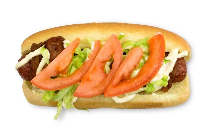 Henry Adaniya is no stranger to hot dogs: Before moving to Hawaii he was a restaurateur in Chicago (where he owned Trio, best known for launching famed chef Grant Achatz). There he saw the beauty of what Doug Sohn did with Hot Doug’s (now closed), and he ventured to create his own haute dogs in Hawaii. The menu ranges from classic Chicago dogs and chili dogs to the extreme Fat Boy, a bacon-wrapped dog that’s deep-fried and topped with lettuce, tomato slices and mayonnaise.