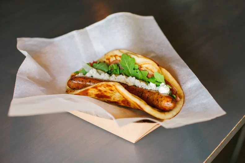 What started as a food truck in the Phoenix area morphed into a successful three-truck, two-shop business that’s all about the love of dogs — both puppies and hot dogs. Each of the hot dogs is named after a customer’s pooch and wrapped in naan instead of the typical bun. Choices include gourmet dogs like the Sunny, a chicken hot dog topped with prosciutto, grilled peaches (or pears in the off season), locally made goat cheese, arugula and a drizzle of honey. For a sweet treat, Short Leash offers Rollover Doughnuts, which are brioche doughnuts made from scratch.