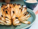Katie Lee makes a Grilled Firework Onion, as seen on The Kitchen, Season 17.