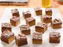 Molly Yeh's Olive Oil Blondies with Chocolate Frosting, as seen on Girl Meets Farm, Season 1.