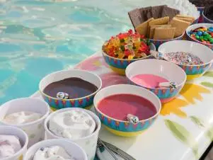 Food beauty of Giada's Fudge Sauce and Strawberry Sauce, as seen on Giada on the Beach, Season 1.