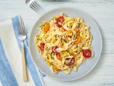 "Combining corn and tomatoes with pasta isn't really something they'd do in Italy, but this dish is definitely Italian in spirit," says Anne.