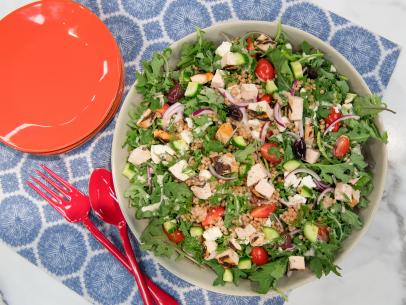 Katie Lee makes a Grilled Chicken and Kale Greek Salad, as seen on The Kitchen, Season 17.
