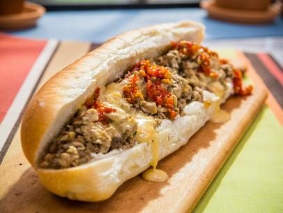 Sunny Anderson makes Chicken Cheesesteaks, as seen on The Kitchen, Season 17.