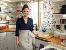 Host Molly Yeh prepares her Challah Bread, as seen on Girl Meets Farm, Season 1.