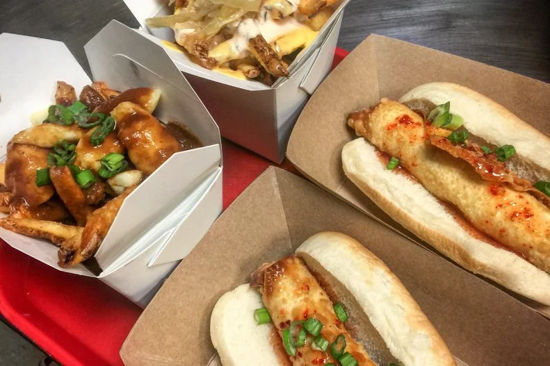 What started as a joke between friends — about a hot dog speakeasy in the old basement bar of Krunkwich Ramen House — turned into an reality. This late-night weekend pop-up serves a diverse array of hot dogs from the ramen shop after it’s finished serving noodles. Locally produced Berkwood Farms pork franks serve as the base for most of the Asian, Latin American, French and Midwestern-inspired hot dogs and sides. (The tater tot casserole should be Iowa’s state dish.) The most-popular pick is the Good Dog, inspired by a late-night chat about crab rangoon pizza. Unlike the other franks, this dog is all beef, served alongside a cream cheese and real crab spread, rolled in an egg roll wrapper, deep fried and placed on a bun with housemade sweet chile sauce.