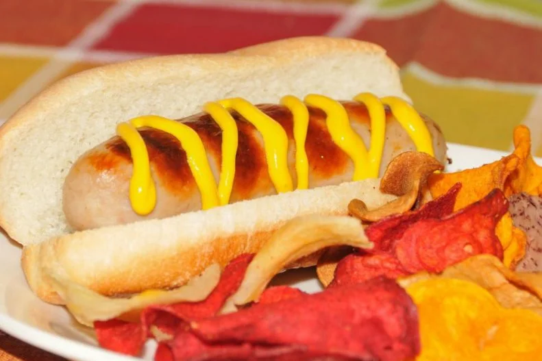 Dirty water dogs, Papaya dogs, truffle mayo-topped gourmet dogs: the Big Apple has long sucked all the air out of New York stateâ  s weenie balloon. But love of franks spread well beyond the borders of the five boroughs. Thatâ  s why itâ  s time to extol the merits of the white hot, a Central and Western New York delicacy most often produced by Zweigleâ  s made from a combination of unsmoked, uncured pork, beef and veal, in a natural casing. Try one at Schallerâ  s Drive-In in Rochester. Open since 1956, the retro lakeside stop seems to have changed little in the decades since. Their classic white hot preparation is topped with the usual meat-based â  hot sauce,â   mustard and onions.