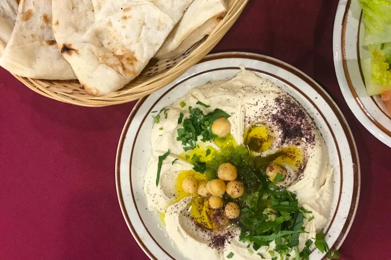 This bright, welcoming spot on Indianapolis’ west side serves traditional Middle Eastern cuisine with a distinct Yemeni flavor. The naan is baked in-house daily, and great with the top-notch hummus. Tables and booths line the dining area, but it’s the privacy of the family-style eating nooks that make the place truly authentic, with pillows lining the floor around large, low tables to share food, and privacy curtains for large families or groups.