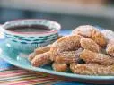 Food beauty of cheater churros with chocolate sauce, as seen on Food Network’s Trisha’s Southern Kitchen Season 12