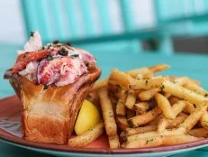 Tucked away in the Harbor View Hotel in Edgartown, Henry’s is a cozy gastropub with a menu of small plates and a focus on locally sourced ingredients, including produce, island-caught sustainable fish and island-harvested shellfish, with farms, fishermen and gardens all listed on the menu. A favorite at Henry’s is the knuckle sandwich, composed of fresh lobster meat, fried capers and lemon on buttered brioche roll, and the local cioppino, made with MV-harvested shellfish, prawns, calamari and tomato broth. Henry’s is open year-round, one more reason to be a fan of the intimate spot.