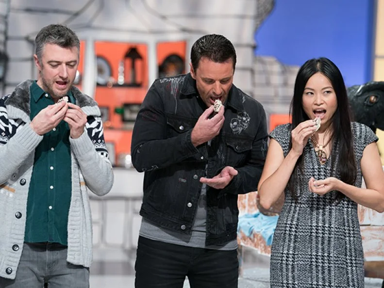 Judges Shinmin Li, Todd Tucker and Sean Gunn, sample the tasting element from Zesty Zombies, as seen on Halloween Wars, Season 8.