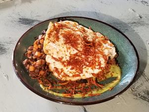 Mojo Hash (coffee braised beef, diced sweet, roasted mushrooms, with 2 over easy eggs and scallion pesto) at The Yolk, as seen on Comfort Food Tour, Season 2.