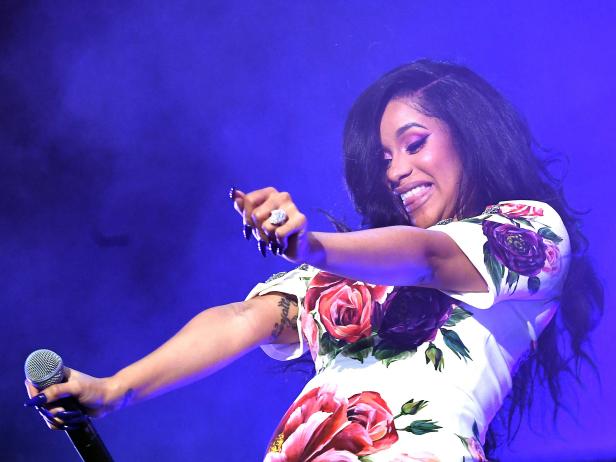 ATLANTA, GA - JUNE 16:  Cardi B performs on stage during Hot 107.9 Birthday Bash at Cellairis Amphitheatre at Lakewood on June 16, 2018 in Atlanta, Georgia.  (Photo by Paras Griffin/Getty Images)