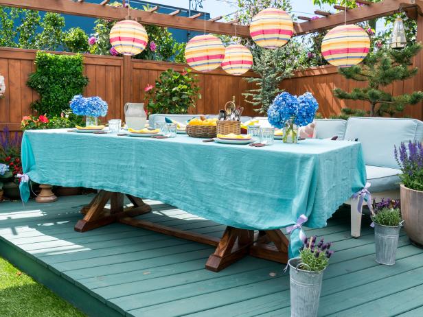 The exterior picnic table, during the No-Fail Party Prep with Lowe's integration, as seen on The Kitchen, Season 17.