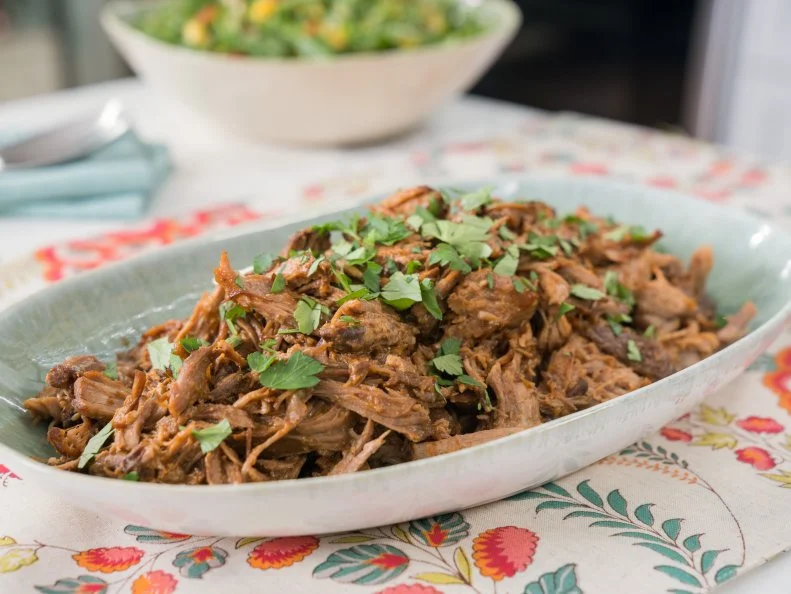 Food beauty of pulled pork sandwiches and peach bbq sauce, as seen on Trisha's Southern Kitchen, Season 12.