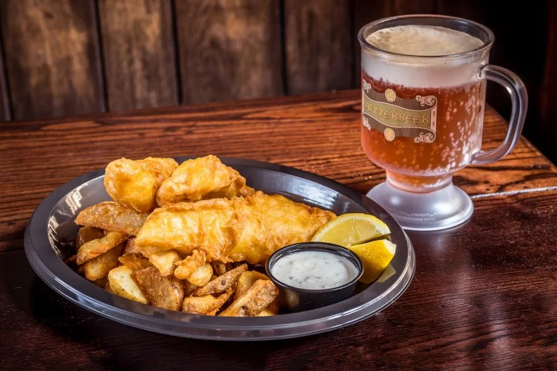 Harry Potter die-hards would fly on Quidditch brooms, if necessary, to lunch even once in Diagon Alley. The fact that the grub is good is a bonus. Leaky Cauldron is located within Universal Orlandoâ  s literary-based Wizarding World fantasyland, and specializes in fast-casual British pub fare. Go for fish â  nâ   chips, a Ploughmanâ  s Platter that includes Scotch eggs, and drinks with silly names like Tongue Tying Lemon Squash (made with a whole lemon) to best enjoy the gloomy, pubby, Hogsmeade-esque surroundings.