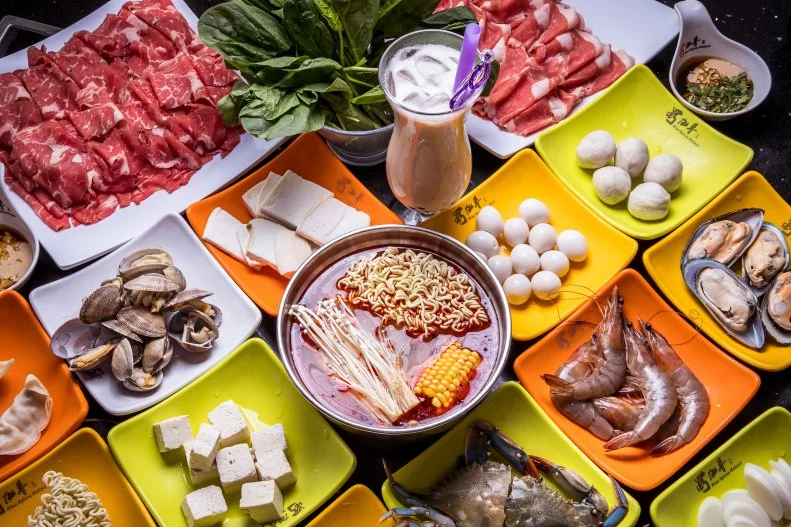 Settle in for a couple of hours, as youâ  ll need that long to make your own meal, again and again, at Nine Spices Hot Pot. Choose a broth, bring over bowls of each sauce from a toppings bar, and let the fun begin. A wide variety of proteins, vegetables and noodles will pass by your table via a slow-moving conveyor belt. Grab what you want, heat it in the broth, doctor it up to your liking, then eat. Repeat. Repeat. Repeat.