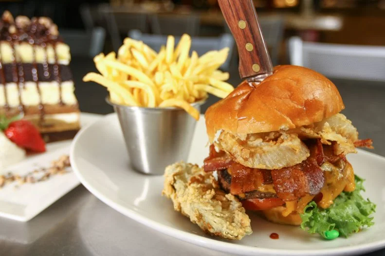 If you choose The Kitchen for its costumed characters (Bart! Or maybe Minions!), you won’t be the first. But photo ops and a playroom are secondary to the food at this Hard Rock Hotel favorite, where the chefs turn out notably fine renditions of American staples. Whether you opt for the classic Kitchen Burger made with Black Angus beef, bacon, cheddar and chipotle-horseradish aioli, pan-seared red snapper with champagne sauce or an edgier flash-fried gator tail with horseradish aioli, you’ll likely be singing this rock ‘n’ roll-themed hotel a thank-you tune.