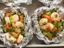 Close-up of Teriyaki Shrimp & Pineapple Parcels, as seen on The Pioneer Woman, Season 19.