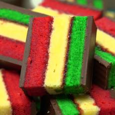 At Gian Piero Bakery in Queens, New York, the layers of a rainbow cookie aren't just colorful, they're flavorful. The red layer is strawberry, the green is pistachio, sandwiched around the plain white layer with a layer of raspberry Jam, as seen on Food Network's Baked, Season 1