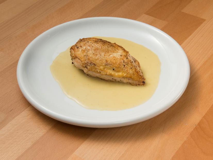 Co-host Robert Irvine's chicken with pan sauce dish, as seen on Worst Cooks In America, Season 14.