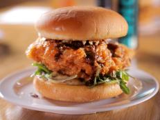 <p>New York chef Brian O'Conner trained in classic cuisine but ended up falling for fried chicken. The dishes at Bok A Bok Fried Chicken &amp; Biscuits highlight his love for the bird. The Soy Sesame Garlic Sandwich is fried up until potato chip crispy, topped with sweet soy sauce and arugula and served on a roll spread with lemon aioli.</p>