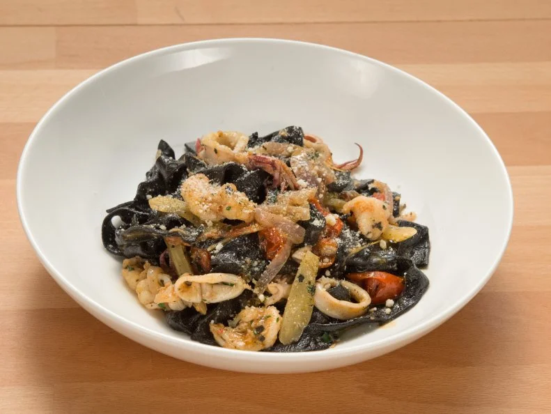 Co-host Anne Burrell's squid ink pasta dish, as seen on Worst Cooks In America, Season 14.