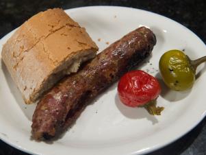 Santarpio's Pizzas' sausage and peppers with Santarpio's bread, as seen on Baked With Tom Papa, Season 1.