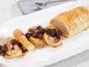 Pork Wellington is displayed, as seen on Let's Eat, Season 1.
