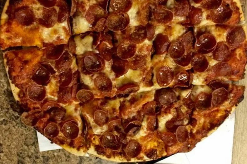Slice into Italian tradition at Tommy’s Pizza. First opened in 1952, the Columbus institution still follows the same family recipe brought over from Italy by founder and namesake Tommy Iacono. The pies feature cracker-thin crusts crisped into light layers and slicked with fresh sauces. And in the style associated with Columbus since the 1930s, the pizza is cut into squares. This old-school approach continues to pay off for the no-frills pizzeria, which has expanded into several locations that still hold their own against fancier spots featuring newfangled toppings. As for the salad, Tommy’s is an arugula-free zone, so expect crunchy iceberg lettuce dressed with good olive oil, loads of garlic, salt and pepper, and a tiny pinch of sugar.
